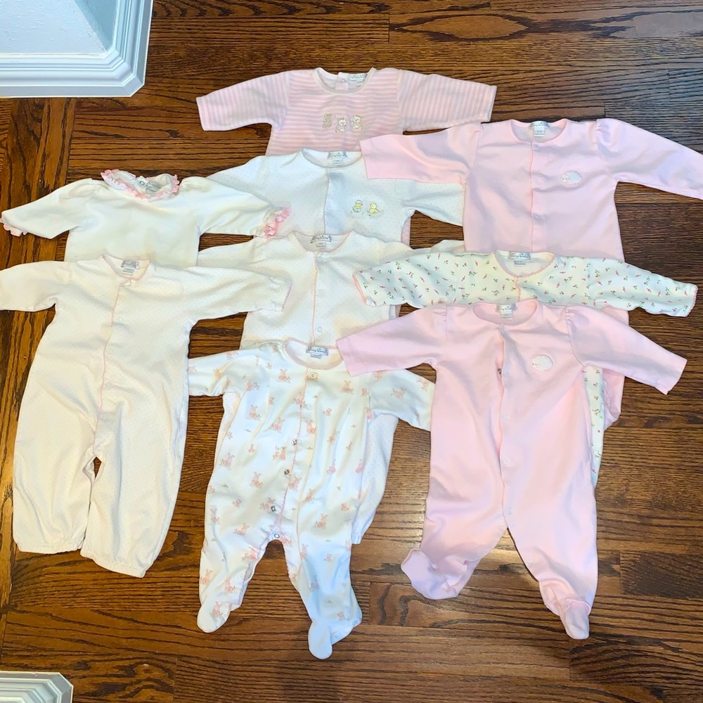 Nine Kissy Baby outfits (pink/white)